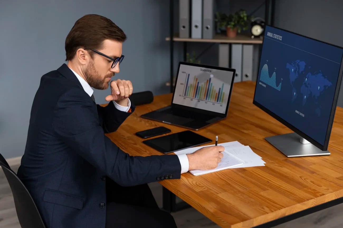 Financial advisor reviewing June 2026 market update charts at desk in Meridian Idaho Treasure Valley